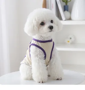 Close-up of breathable mesh pet vest detail with purple trim, cool lightweight design for small dogs.