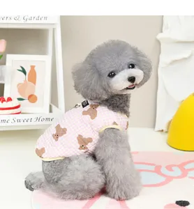 Cute pink plaid dog vest detail, warm cotton winter pet clothing with adorable bear print.
