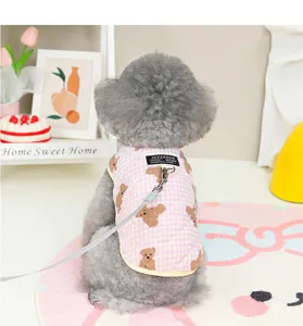Detailed view of a cute pet winter warm vest with adorable bear pattern and leash ring.