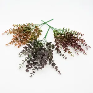 Artificial plastic eucalyptus plant bundles for home decoration and green foliage.