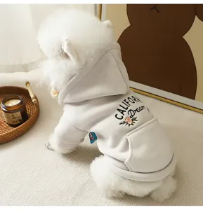 Close-up detail of cozy grey pet fleece hoodie for small dogs, featuring back embroidery.