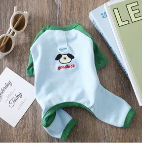 Detail view of spring summer pet four-legged dog clothes cartoon puppy home apparel with ring.