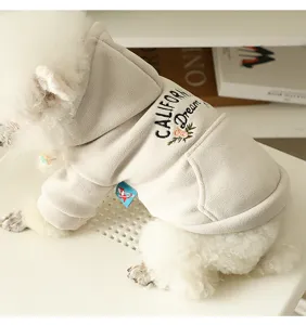 Detailed view of the cozy fleece dog hoodie with back embroidery and warm hood for small pets.
