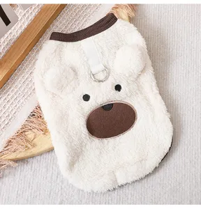 Cute fleece pet dog vest detail showing soft beige fabric, brown collar and bear face design.