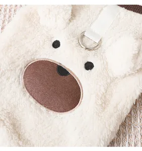 Cute bear embroidery detail of the soft fleece pet dog winter vest with leash D-ring.