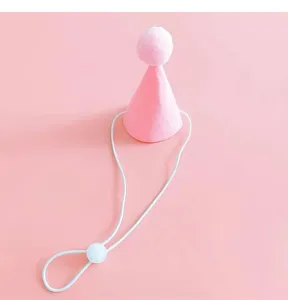 Cute pink pet birthday hat with pom pom and adjustable elastic chin strap for small dogs cats.