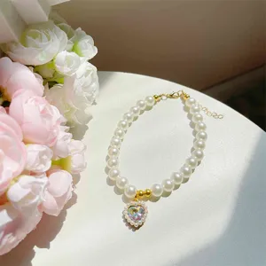 Princess style pet pearl necklace detail view, featuring sparkling heart crystal pendant for cats.