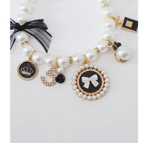 Pet pearl necklace for dogs cats stylish vintage charm collar with bow and cute pendants.