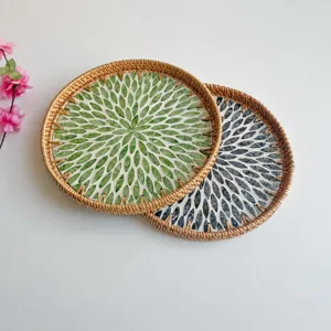 Handmade rattan decorative tray with inlaid shell leaf pattern, ideal for home storage.