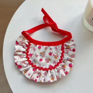 Cute floral pet bib with red bow and ruffles, perfect for cats and small dogs daily wear.