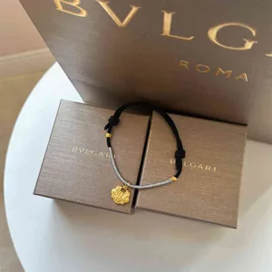 Handmade woven pet collar with traditional gold lock pendant for dogs, fashion puppy necklace.