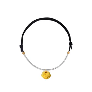 Handmade pet necklace with gold lock pendant and woven strap for stylish dogs and puppies.