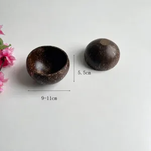 Detailed view of natural coconut shell candle cup, eco-friendly container for home decor.
