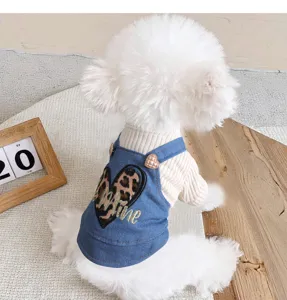 Cute dog denim overall skirt detail showing soft knit top and leopard heart embroidery.