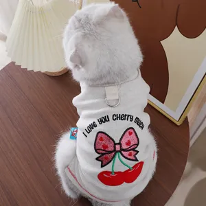 Grey pet cat sweater detail featuring cute cherry embroidery and warm ribbed knit fabric.