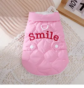 Pink quilted pet winter vest with traction D-ring and cute smile embroidery for cats