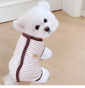 Cute striped dog four-legged clothes detail, brown and white knitted pet apparel for small dogs.