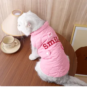 Pink quilted pet vest for cats, cozy autumn winter apparel with cute embroidery, easy traction.