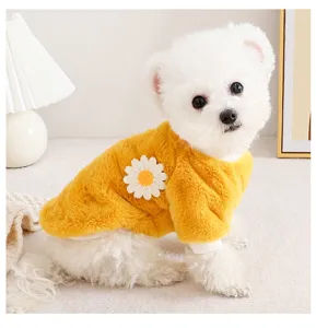 Cozy pet fleece sweater detail featuring soft yellow fabric and cute daisy flower applique.