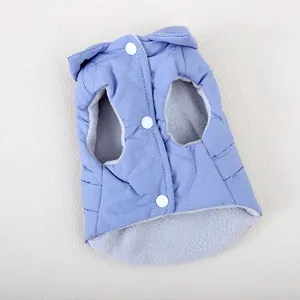 Cozy blue quilted pet vest with warm fleece lining and snap buttons for dogs and cats.