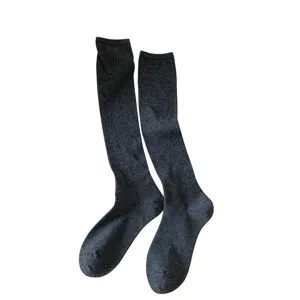 Classic dark grey ribbed knee high socks for women, soft knit texture, everyday wear.
