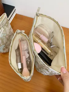 Large capacity jacquard cosmetic bag with cute butterfly pattern, portable travel makeup pouch.