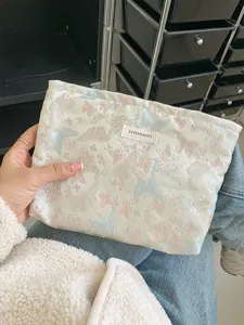 Aesthetic jacquard butterfly cosmetic bag, large capacity portable storage pouch for travel.