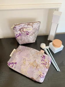 Purple embroidered flower large capacity cosmetic bag portable travel storage makeup pouch organizer.