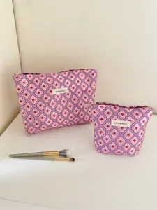 Pink floral quilted cosmetic bag set, large capacity portable ins style makeup storage pouch.
