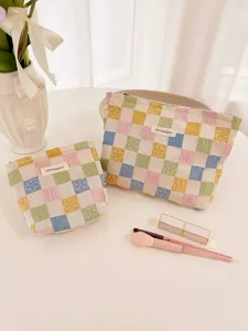 Quilted checkerboard floral embroidery makeup bag, portable travel cosmetic storage pouch.