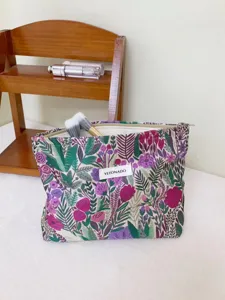 Floral embroidered large capacity cosmetic bag, portable makeup storage pouch for travel.