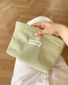 Solid color corduroy cosmetic bag large capacity portable toiletry pouch clutch organizer.