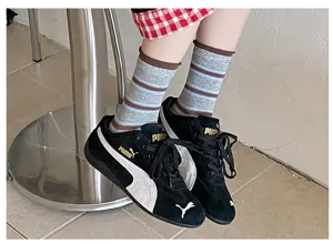 Striped slouch socks for women, retro color-block mid-calf socks for autumn daily wear.