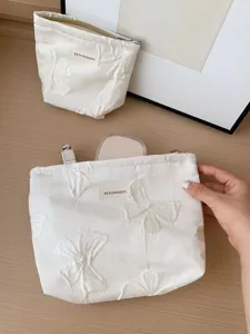 Sac à cosmétiques rétro en fil teint avec nœud, pochette de maquillage portable grande capacité
