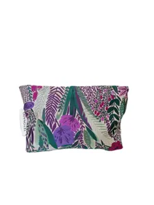 Close-up detail of embroidered floral cosmetic bag, portable travel pouch for skincare and makeup.