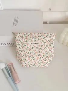 Floral cotton canvas cosmetic bag detail view, vintage portable daily storage pouch.