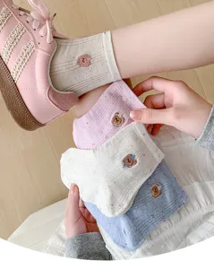 Cute bear embroidered short socks for women, soft breathable cotton blend casual detail.