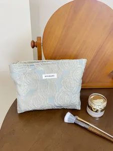 Cosmetic bag with embossed rose pattern large capacity portable storage bag for women storage