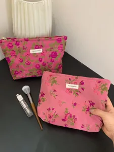 Floral makeup bag, portable canvas cosmetic storage pouch for travel toiletries and essentials.