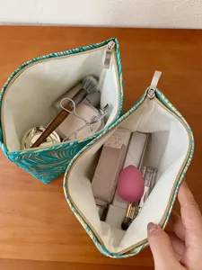Large capacity jacquard cosmetic bag portable travel makeup storage pouch for toiletries.