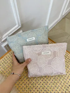 Embossed rose cosmetic bag large capacity travel makeup pouch stylish women clutch purse