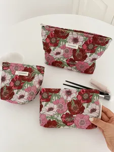 Woven floral cosmetic bag set, elegant vintage makeup pouch and portable toiletry organizer for women.