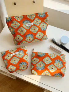 Ethnic style cosmetic bag set, portable orange makeup pouch with vintage floral print for travel.