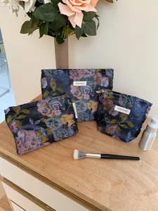Vintage floral cosmetic bag set, large capacity portable travel pouch for daily makeup essentials.