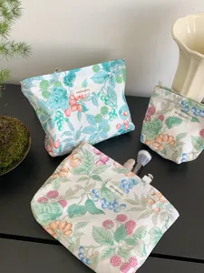 Ensemble de trousses de maquillage florales en coton avec fermeture éclair et grande capacité.