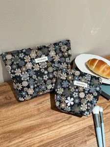 Floral jacquard cosmetic bag set, elegant fabric toiletry pouch for travel storage daily use.