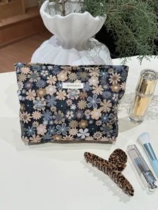 Floral jacquard cosmetic bag travel toiletry pouch portable makeup organizer for women.