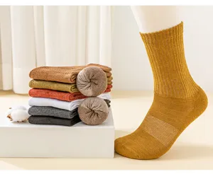 Details of thick thermal women winter mid-tube cotton socks with warm loop pile design.