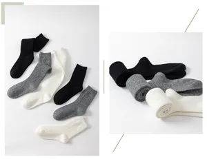 Detailed view of women's autumn winter cashmere over-the-knee socks with diamond pattern.