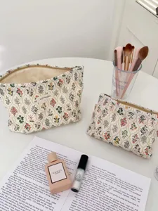 Detailed shot of Japanese fresh floral cosmetic bag, portable makeup pouch for daily use.
